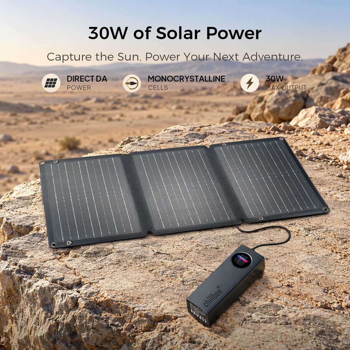 30W portable solar panel charging a BeeCell 99 power bank on rocky ground